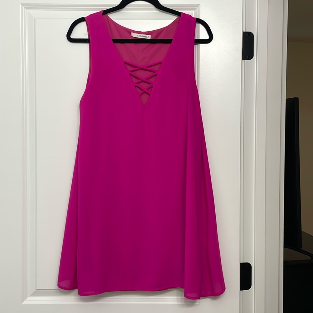 Pink mini dress with cross cross detail. Slip on